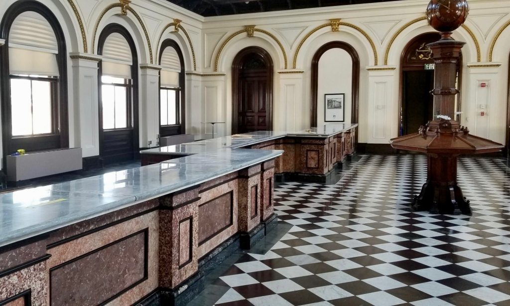 Paul White Company installed his tile flooring and stone countertop renovation at the Custom House in Portland, Maine