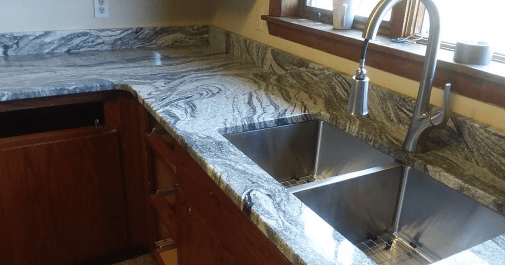 a countertop newly redone for the winner of paul white company's ugly countertop contest